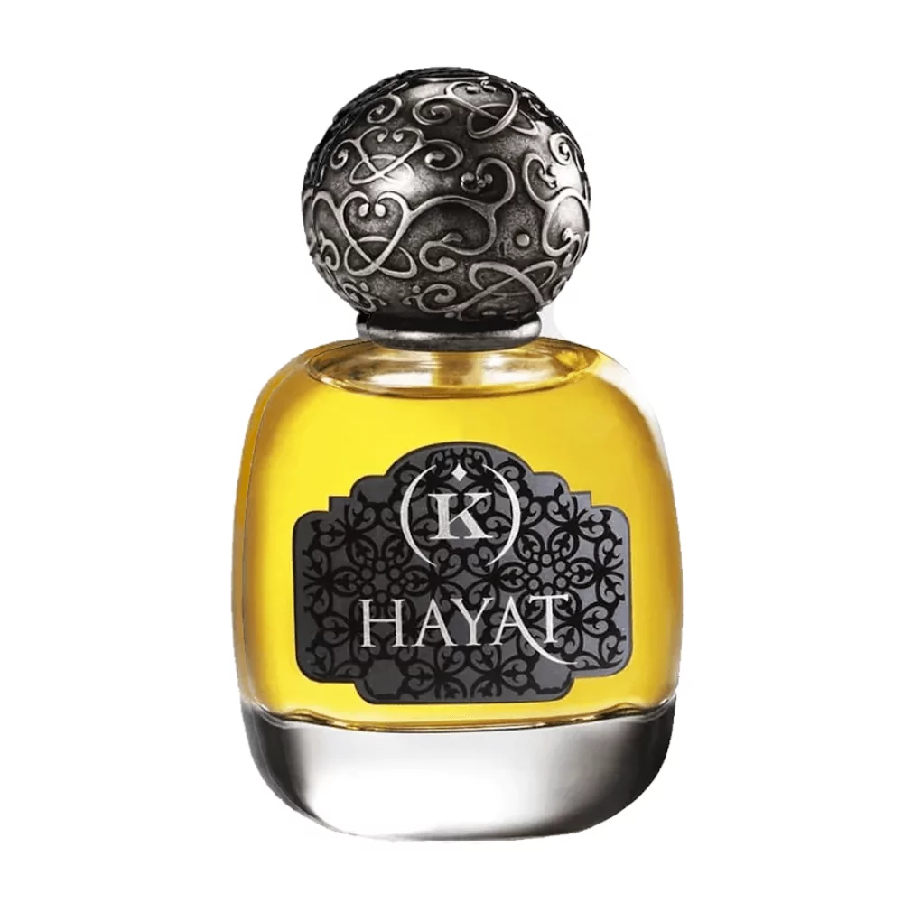 Kemi Blending Magic Hayat Edp 50Ml Bottle With A Warm, Rich Background, Highlighting Cardamom And Amber Notes.