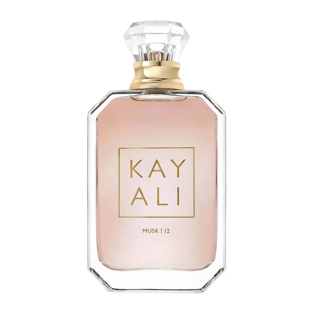 Kayali Musk 12 Edp 100Ml Bottle With A Soft, Floral Background, Highlighting Vanilla And Musk Notes.