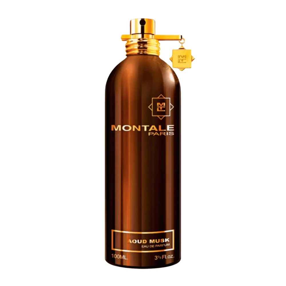 Montale Aoud Musk Edp 100Ml Bottle Set Against A Rich, Woody Background, Highlighting Saffron And Vetiver Notes.