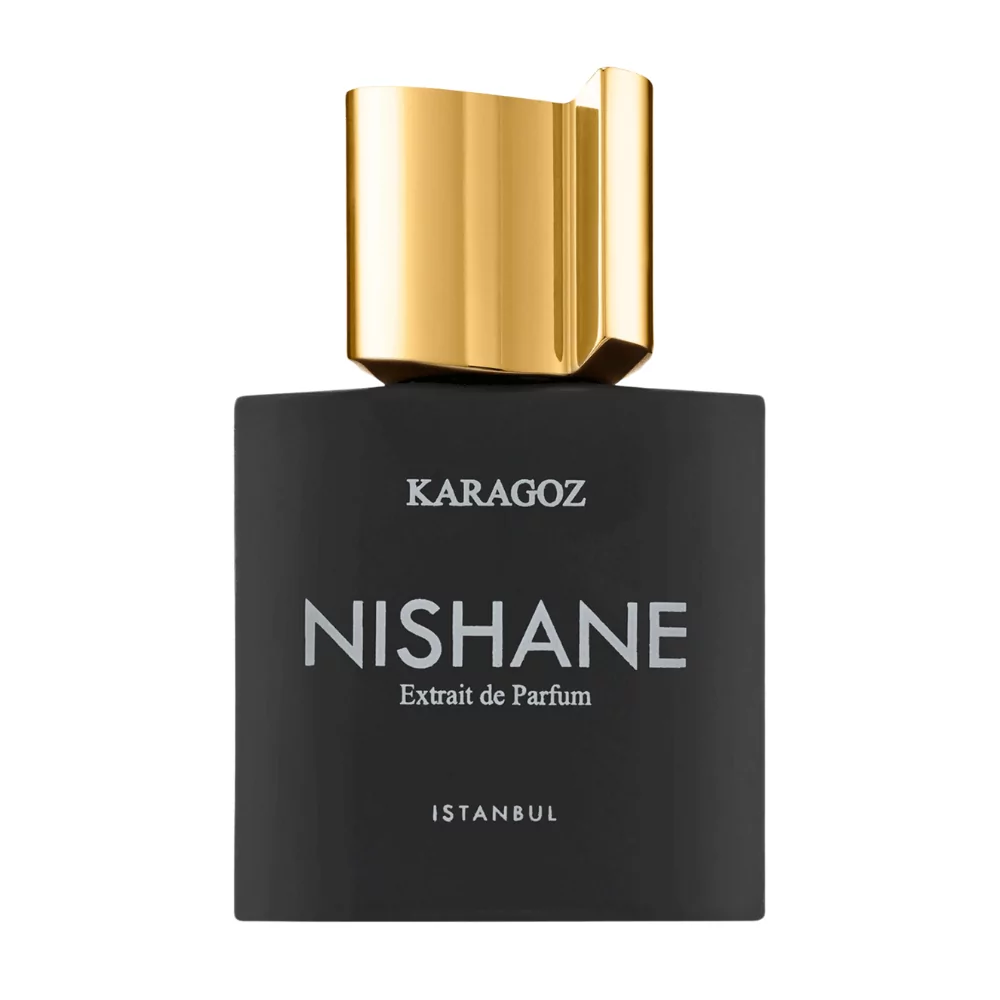 Nishane Karagoz Extrait 50Ml Bottle Set Against A Tropical Background, Highlighting Pineapple, Patchouli, And Amber Notes.