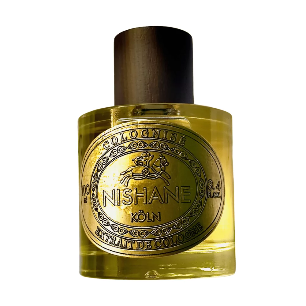 Nishane Safran Colognise Extrait De Cologne 100Ml Bottle On A Luxurious Background, Highlighting Notes Of Saffron, Leather, And Pink Grapefruit.