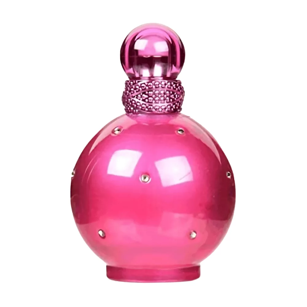 Britney Spears Fantasy Edp 100Ml Bottle On A Playful Background, Highlighting Notes Of Kiwi, White Chocolate, And Musk.